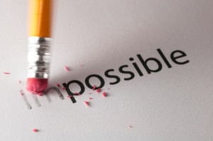 pencil erasing part of the word impossible